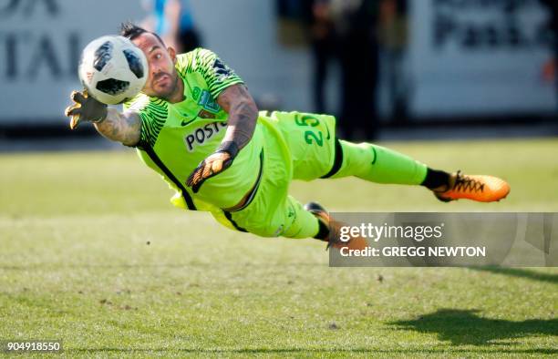 Kick just gets past the outstretched arm of goal keeper Christian Vargas of Colombian side Atletico Nacional on a second half goal for Brazilian club...