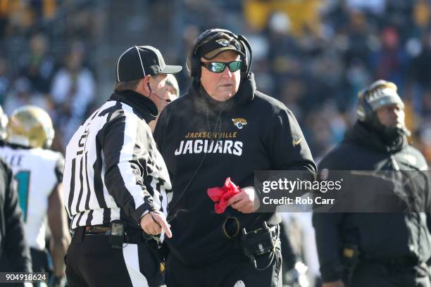 Head coach Doug Marrone of the Jacksonville Jaguars talks to a referee against the Pittsburgh Steelers during the first half of the AFC Divisional...