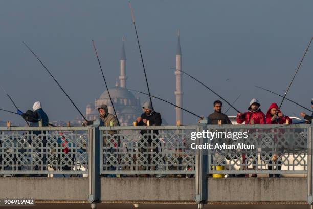 the galata bridge, eminonu,fatih district in istanbul,turkey - plaza eminonu fotografías e imágenes de stock