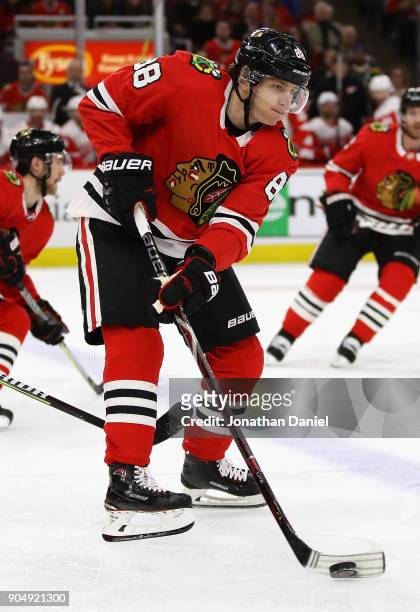 Patrick Kane of the Chicago Blackhawks controls the puck against the Detroit Red Wings at the United Center on January 14, 2018 in Chicago, Illinois....
