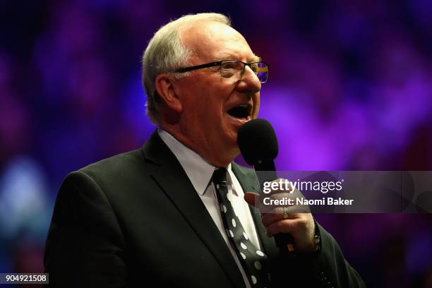 Dennis Taylor speaks to the crowd on day one of The Dafabet Masters at Alexandra Palace on January 14, 2018 in London, England.