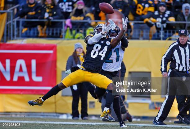 Antonio Brown of the Pittsburgh Steelers makes a catch while being defended by A.J. Bouye of the Jacksonville Jaguars for a 43 yard touchdown...