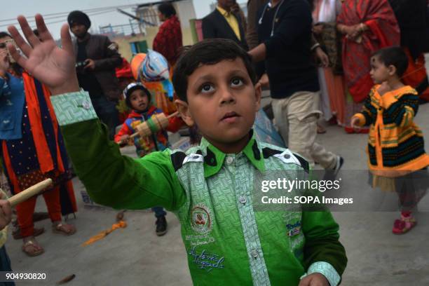 Bangladeshi children during kite flying at Shakrain Festival in southern part of the capital Dhaka , Bangladesh.The idea behind the festival is about...