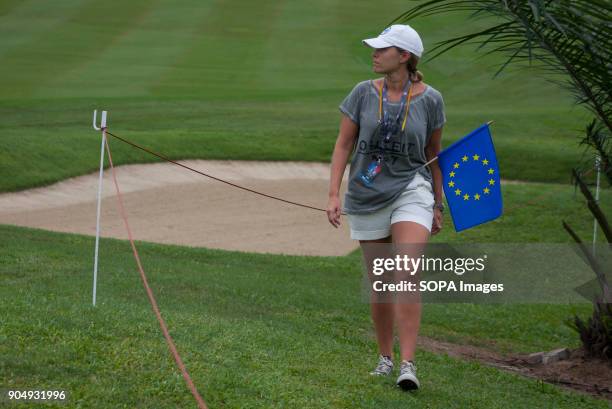 Women is seen with Europe flag on the last day at EurAsia Cup 2018. EurAsia Cup is a biennial men professional team golf tournament between Europe...