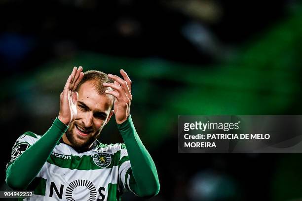 Sporting's Dutch forward Bas Dost applauds during the Portuguese league football match between Sporting CP and CD Aves at the Jose Alvalade stadium...
