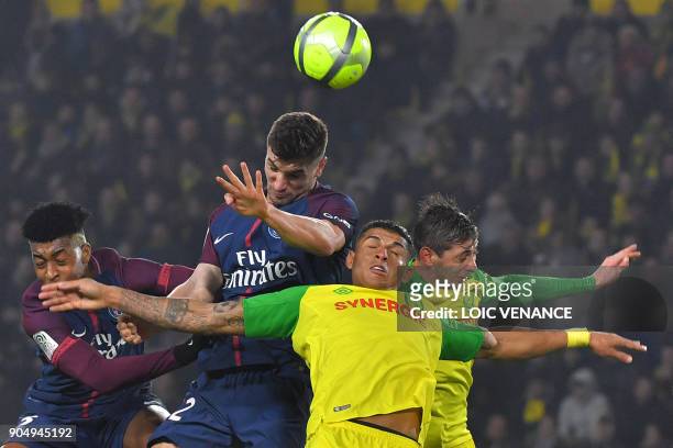 Nantes' Brazilian defender Diego Carlos vies with Paris Saint-Germain's Spanish forward Jese during the French L1 football match between Nantes and...
