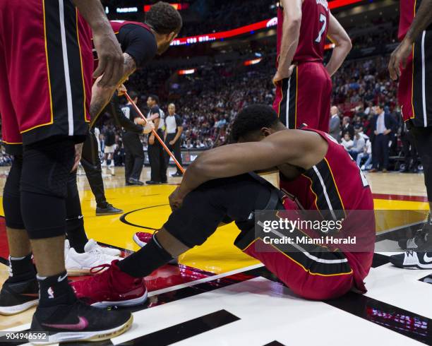 Miami Heat center Hassan Whiteside reacts after being fouled by Milwaukee Bucks Malcolm Brogdon in the second quarter on Sunday, Jan. 14, 2018 at the...