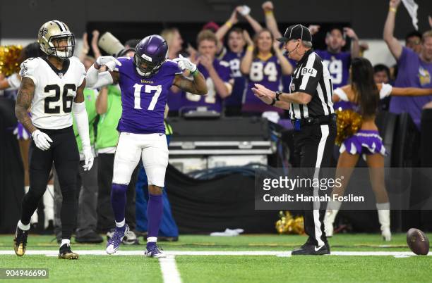Jarius Wright of the Minnesota Vikings celebrates after picking up a first down in the first quarter of the NFC Divisional Playoff game against the...