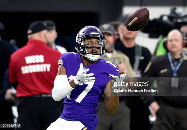 Jarius Wright of the Minnesota Vikings catches the ball in the first quarter of the NFC Divisional Playoff game against the New Orleans Saints on...