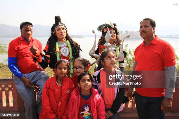 Foreign tourists flying kites and enjoy during the Kite Festival on the occasion of Makar Sakranti at Jal Mahal of Jaipur, Rajasthan,India on 14...