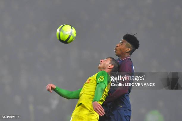 Nantes' Argentinian forward Emiliano Sala vies with Paris Saint-Germain's French defender Presnel Kimpembe during the French L1 football match...