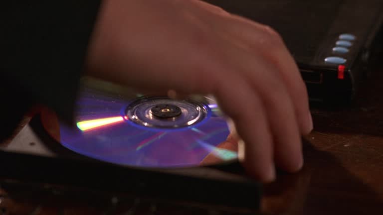 Please Insert Cd Rom 60 Inserting Cd Stock Videos, Footage, & 4K Video Clips - Getty Images