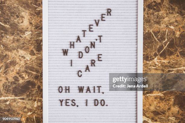 letter board phrase denial indecision whatever i don't care - buchstabentafel stock-fotos und bilder