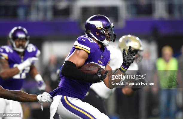 Anthony Barr of the Minnesota Vikings runs with the ball after intercepting Drew Brees of the New Orleans Saints in the second quarter of the NFC...