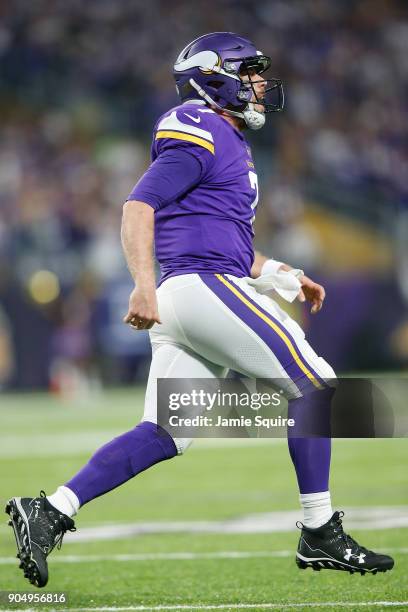 Case Keenum of the Minnesota Vikings celebrates after a touchdown against the New Orleans Saints during the first half of the NFC Divisional Playoff...