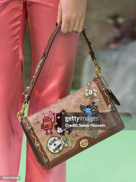 Maisie Williams, bag detail. Attends the 'Early Man' World Premiere held at BFI IMAX on January 14, 2018 in London, England.