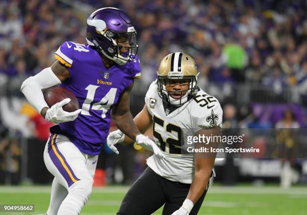 Minnesota Vikings wide receiver Stefon Diggs runs after the catch as New Orleans Saints linebacker Craig Robertson gives chase during a NFC...