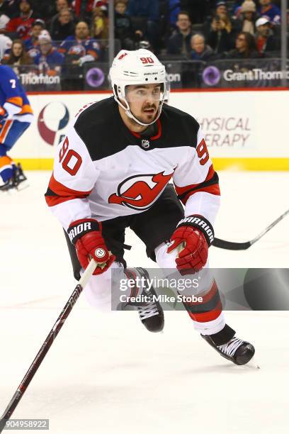 Marcus Johansson of the New Jersey Devils skates against the New York Islanders at Barclays Center on January 7, 2018 in New York City. New York...