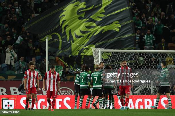 Sporting CP forward Bas Dost from Holland celebrates scoring Sporting second goal with his team mates during the Portuguese Primeira Liga match...