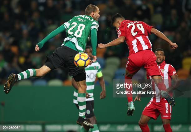 Sporting CP forward Bas Dost from Holland with CD Aves midfielder Claudio Falcao from Brazil in action during the Primeira Liga match between...