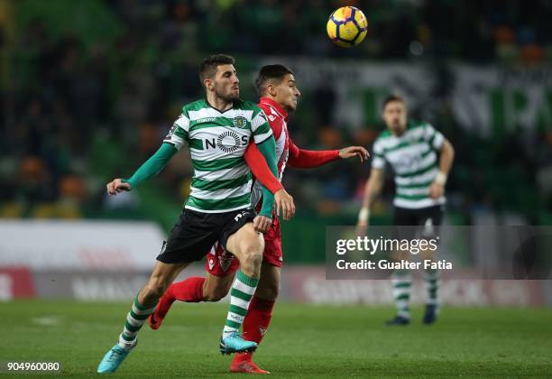 Aves forward Cristian Arango from Colombia with Sporting CP defender Cristiano Piccini from Italy in action during the Primeira Liga match between...