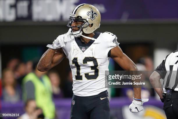Michael Thomas of the New Orleans Saints reacts after a touchdown against the Minnesota Vikings during the second half of the NFC Divisional Playoff...