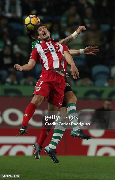 January 14: Sporting CP defender Sebastian Coates from Uruguay vies with Aves forward Alexandre Guedes from Portugal for the ball possession during...