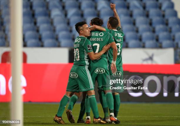 Rio Ave FC forward Helder Guedes from Portugal celebrates with teammates after scoring a goal during the Primeira Liga match between CF Os Belenenses...