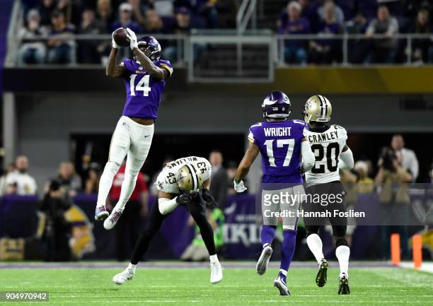 Stefon Diggs of the Minnesota Vikings leaps to catch the ball in the fourth quarter of the NFC Divisional Playoff game against the New Orleans Saints...