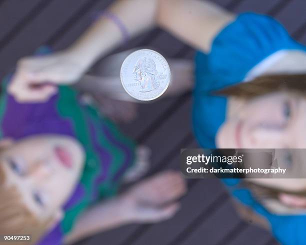 head or tail - münzwurf stock-fotos und bilder