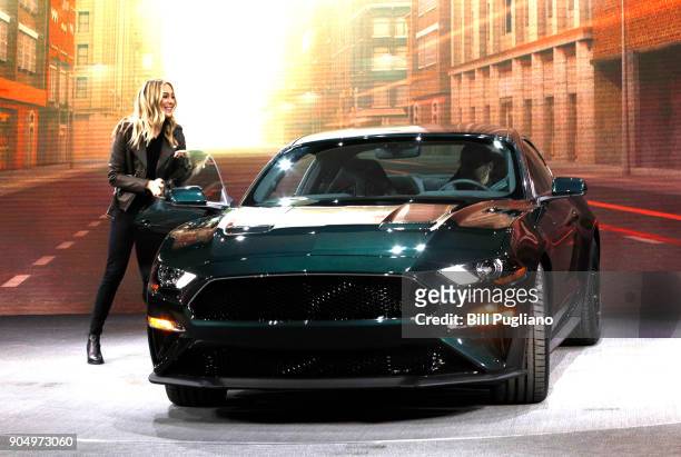 Molly McQueen, the granddaughter of actor Steve McQueen, gets out of the new 2018 Ford Mustang Bullitt at its debut at the 2018 North American...