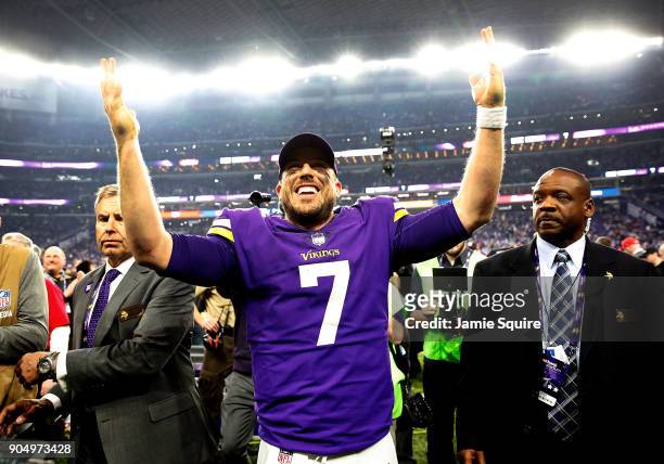 Quarterback Case Keenum of the Minnesota Vikings celebrates as he walks off the field after the Vikings defeated the New Orleans Saints 29-24 to win...