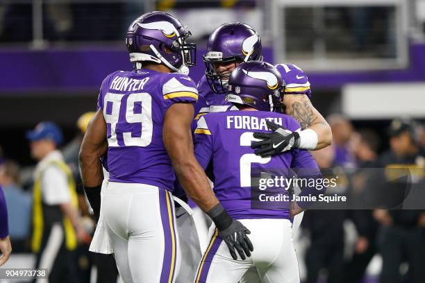 Kai Forbath of the Minnesota Vikings celebrates with teammates after kicking a field goal against the New Orleans Saints during the second half of...