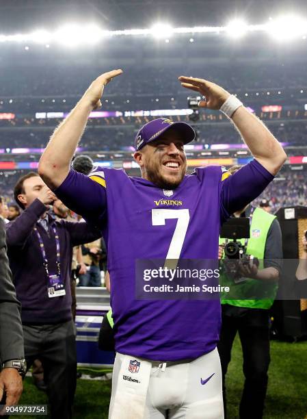 Quarterback Case Keenum of the Minnesota Vikings celebrates as he walks off the field after the Vikings defeated the New Orleans Saints 29-24 to win...