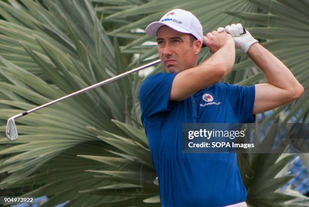 Ross Fisher is seen taking a shot on the last day at EurAsia Cup 2018. EurAsia Cup is a biennial men professional team golf tournament between Europe...