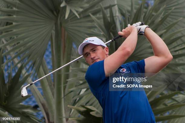 Paul Dunne is seen taking a shoot on the last day at EurAsia Cup 2018. EurAsia Cup is a biennial men professional team golf tournament between Europe...