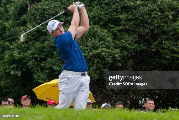 Paul Dunne is seen try to solve the challenge on the last day at EurAsia Cup 2018. EurAsia Cup is a biennial men professional team golf tournament...