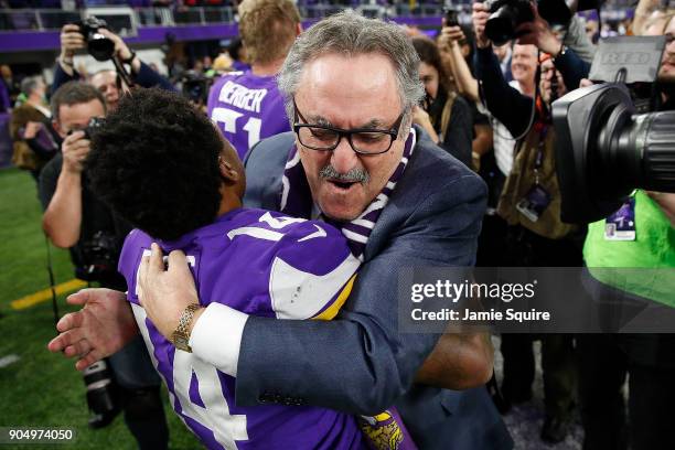 Stefon Diggs of the Minnesota Vikings celebrates with owner Zygi Wilf after defeating the New Orleans Saints in the NFC Divisional Playoff game at...