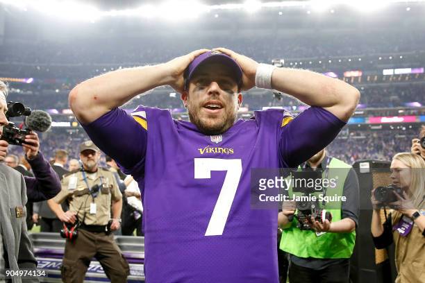 Case Keenum of the Minnesota Vikings celebrates after defeating the New Orleans Saints in the NFC Divisional Playoff game at U.S. Bank Stadium on...