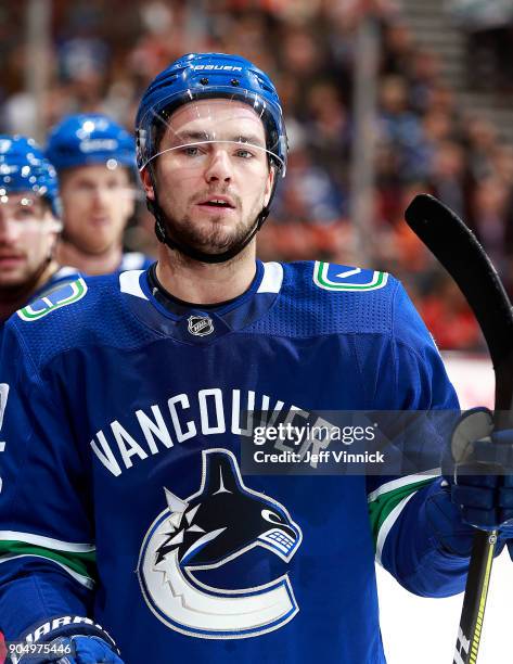 Alexander Burmistrov of the Vancouver Canucks looks on from the bench during their NHL game against the Philadelphia Flyers at Rogers Arena December...