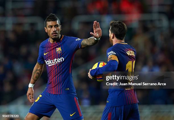 Paulinho of FC Barcelona celebrates with his teammate Lionel Messi of FC Barcelona after scoring the opening goal during the La Liga match between...