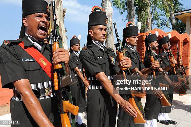 Indian Army Golden Arrow Division brigadiers take part in a ceremony in tribute to late Indian soldier Abdul Hamid at his tomb on his 44rd death...