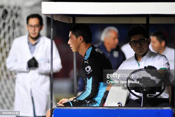 Hugo Gonzalez goalkeeper of Monterrey gets off the field after being injured during the second round match between Veracruz and Monterrey as part of...