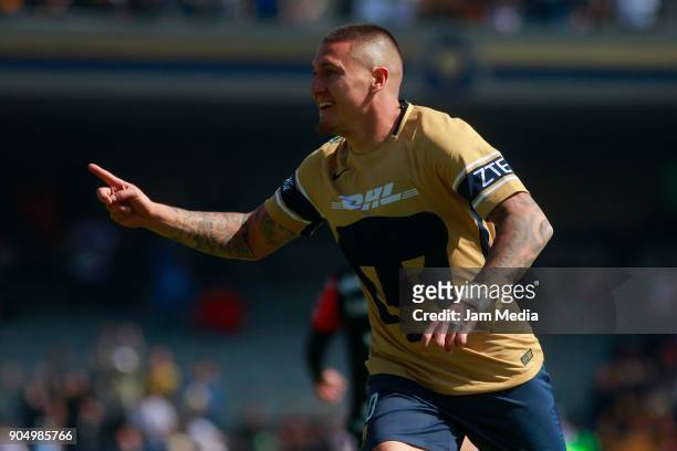 Nicolas Castillo of Pumas celebrates after scoring the first goal of his team during the second round match between Pumas UNAM and Atlas as part of...