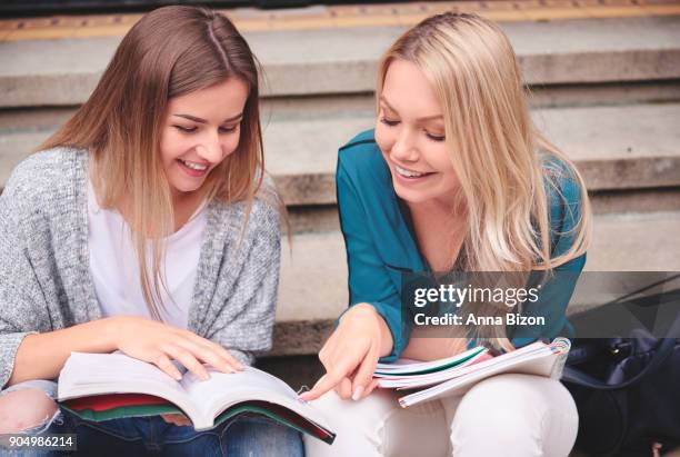 female students preparing for the test. krakow, poland - tuition assistance stock pictures, royalty-free photos & images