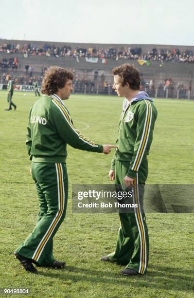 Player manager Johnny Giles of the Republic of Ireland football team with teammate Liam Brady of Arsenal, circa 1976.