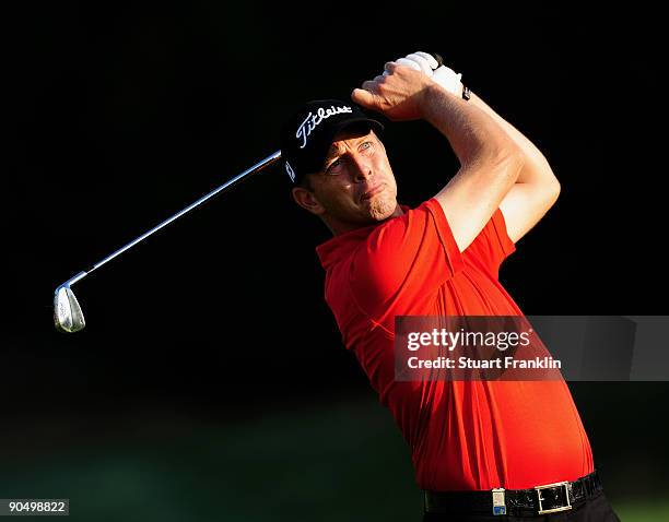 Soren Hansen of Denmark plays his approach shot during the pro - am prior to The Mercedes-Benz Championship at The Gut Larchenhof Golf Club on...