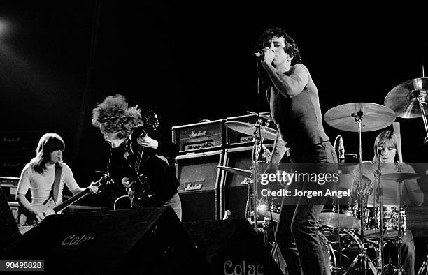 Malcolm Young, Angus Young, Bon Scott Phil Rudd from AC/DC perform live on stage in Copenhagen, Denmark in April 1977