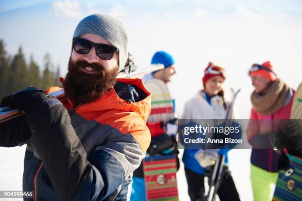 bearded man with ski equipment. zakopane, poland - anna bergman stockfoto's en -beelden