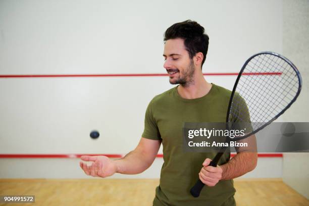 i am certain that i can win this game. debica, poland - squash sport stockfoto's en -beelden